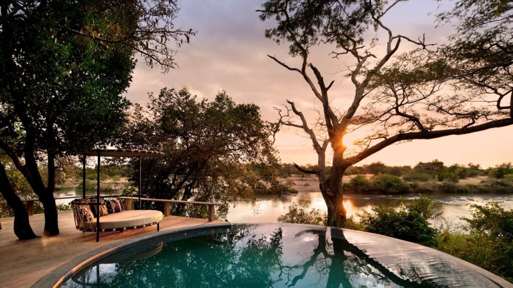 Tanzania Grumeti Serengeti River Lodge Guest Areas pool and loungers 2